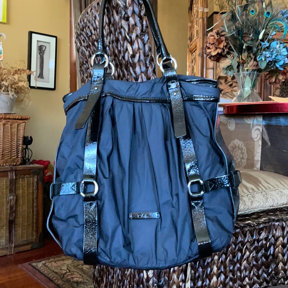 Cole Haan large shoulder bag with wet look detailing. Black